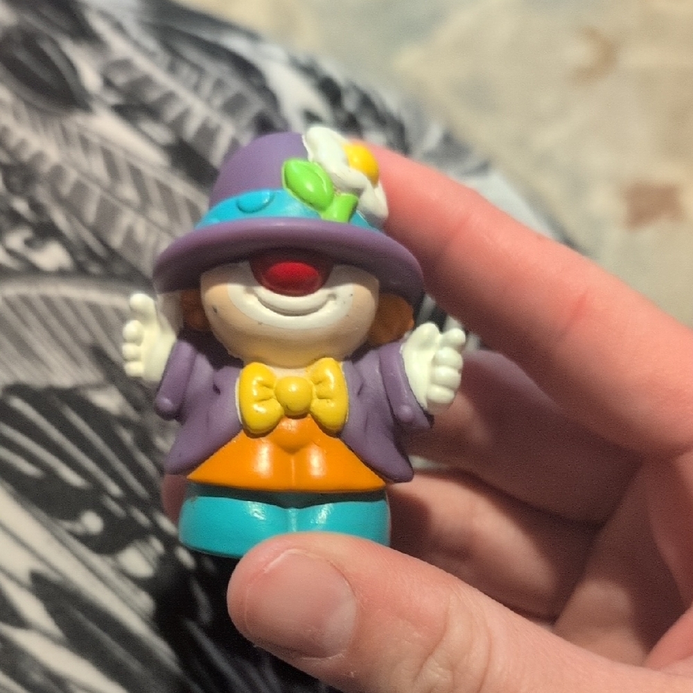 Charming Clown Action Figure with Purple Hat
